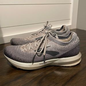 Women’s “Brooks” running shoes, size 9.